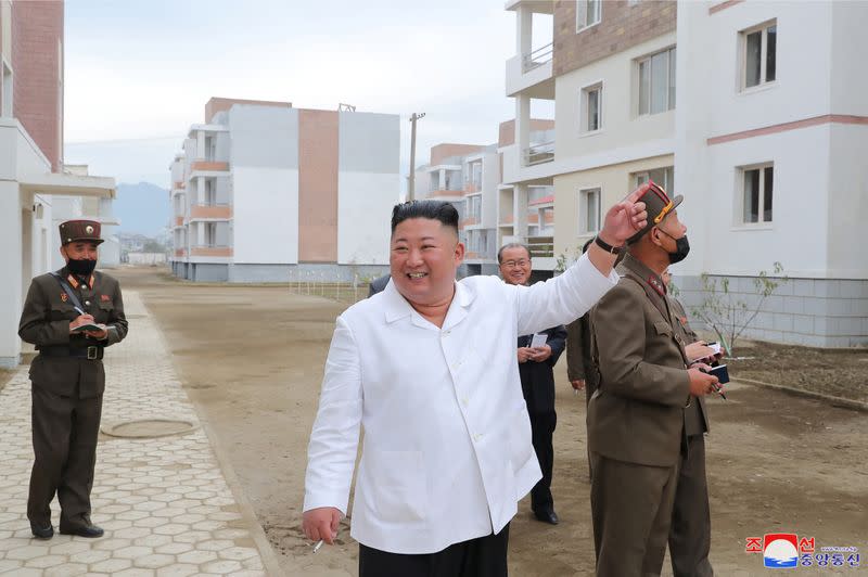 North Korean leader Kim Jong Un inspects sites of reconstruction in Kimhwa County