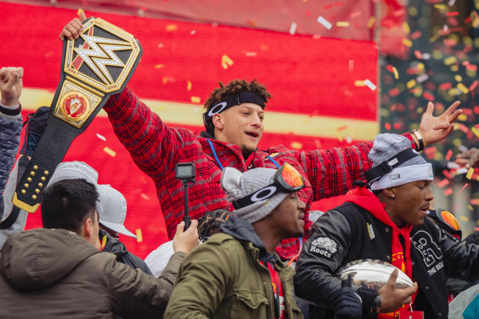 KANSAS CITY, MO - FEBRUARY 05: Patrick Mahomes #15 of the Kansas City Chiefs celebrates with a heavy weight title belt during the Kansas City Chiefs Victory Parade on February 5, 2020 in Kansas City, Missouri. (Photo by Kyle Rivas/Getty Images)