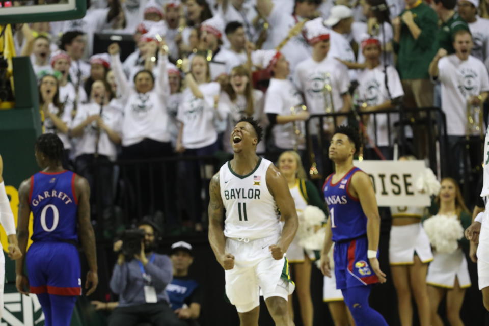 WACO, TEXAS - FEBRUARY 22:  Mark Vital #11 of the Baylor Bears reacts after making a slam dunk against the Kansas Jayhawks in the first half at Ferrell Center on February 22, 2020 in Waco, Texas. (Photo by Ronald Martinez/Getty Images)