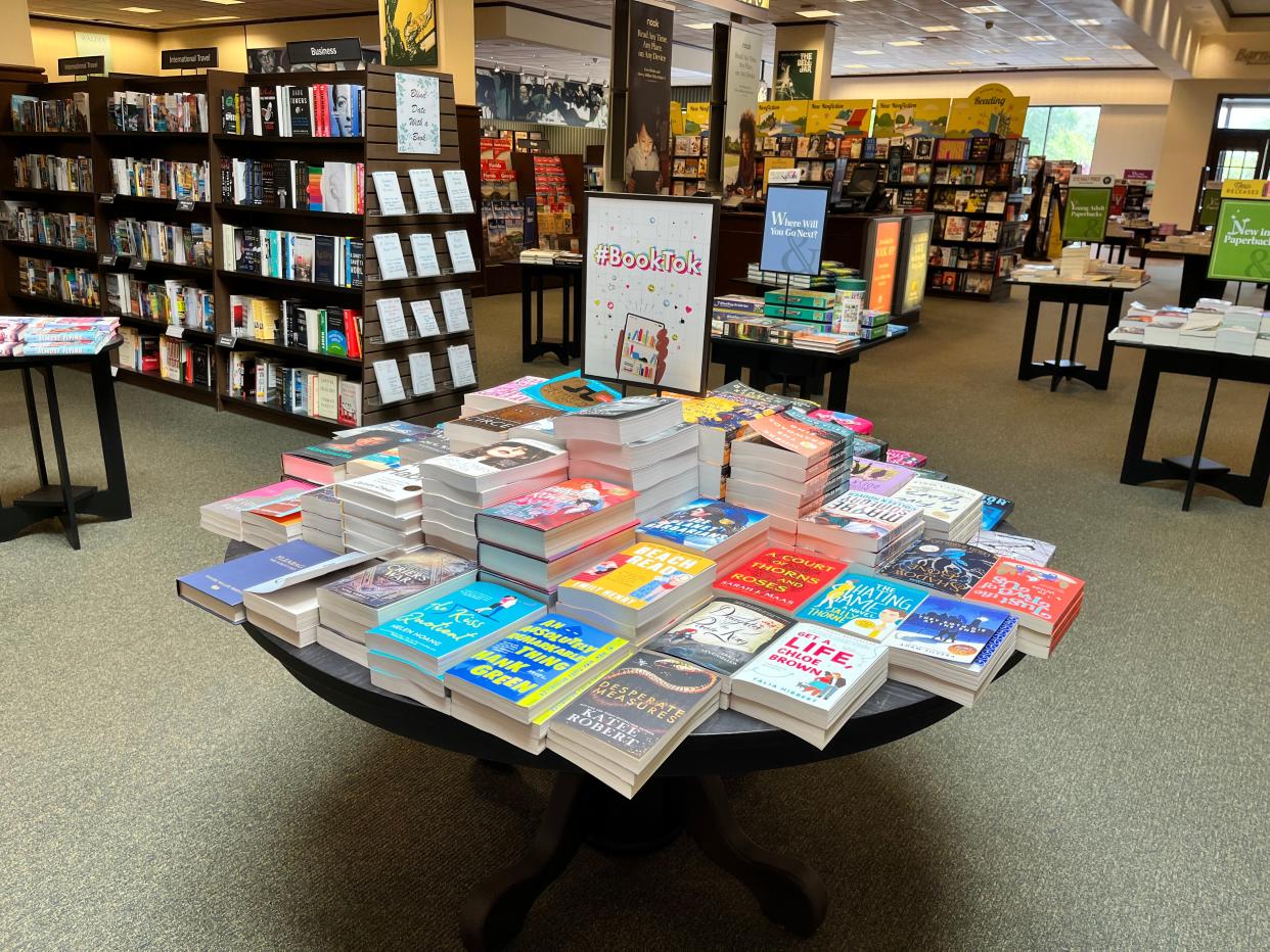 BookTok, a sub-community on the video app TikTok, has made its way into the real world and into local bookstores through displays like this one at the Claire Lane Center Barnes and Noble in Jacksonville.
