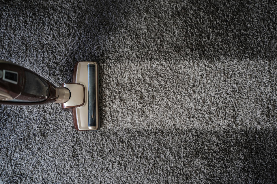 Directly Above Shot Of Vacuum Cleaner On Carpet