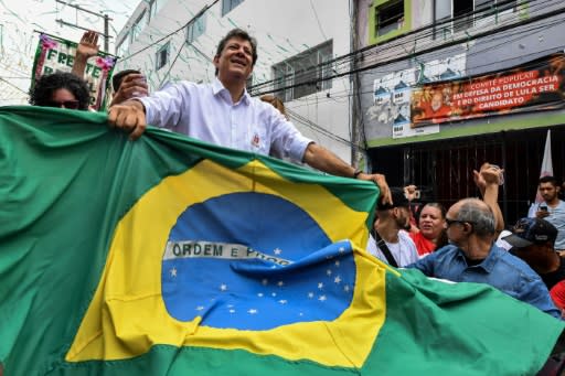 The Brazilian presidential candidates made their final pitches on October 27, 2018 for the election a day later, with leftist Fernando Haddad, seen here, addressing a huge crowd in Sao Paulo while far-right frontrunner Jair Bolsonaro turned to Twitter