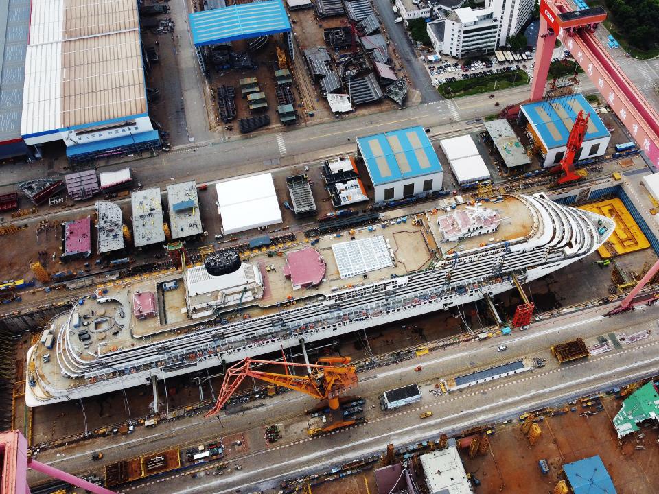 Workers at the construction site of the first built-in-China large cruise ship (H1508), a Vista-class ship owned by CSSC Carnival Cruise Shipping Co., Ltd, at a shipyard of Shanghai Waigaoqiao Shipbuilding Co Ltd, a subsidiary of China State Shipbuilding Corporation Limited (CSSC), on August 3, 2022 in Shanghai, China.