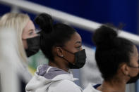 United States gymnast Simone Biles sits on the stands during the artistic gymnastics women's all-around final at the 2020 Summer Olympics, Thursday, July 29, 2021, in Tokyo, Japan. (AP Photo/Natacha Pisarenko)