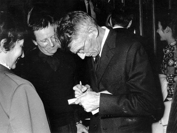 Samuel Beckett signs autographs in 1970 (Reg Lancaster/Express/Getty)