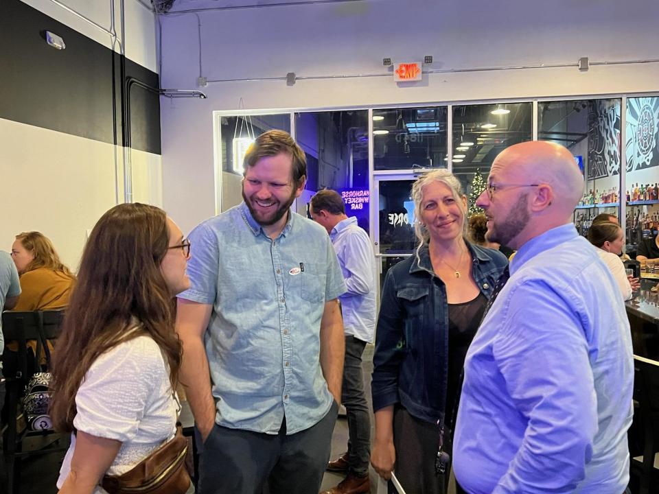 City Commissioners Jack Porter and Jeremy Matlow chat with County Commissioner-Elect David O'Keefe and supporters during O'Keefe's watch night party at War House Whiskey Bar East on Capital Circle North East.