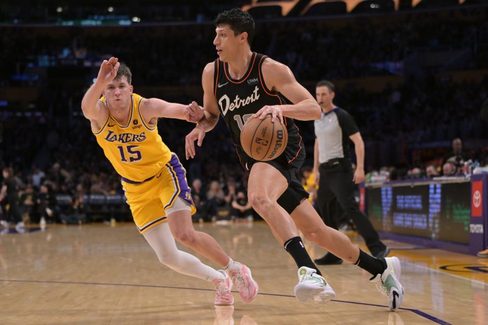 Lakers guard Austin Reaves defends Pistons forward Simone Fontecchio in the second half of the Pistons' 125-111 loss to the Lakers on Tuesday, Feb. 13, 2024, in Los Angeles.