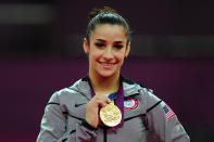 Gold medalist <a href="http://sports.yahoo.com/olympics/gymnastics/alexandra-raisman-1134192/" data-ylk="slk:Alexandra Raisman;elm:context_link;itc:0;sec:content-canvas" class="link ">Alexandra Raisman</a> of the United States poses on the podium during the medal ceremony for the Artistic Gymnastics Women's Floor Exercise final on Day 11 of the London 2012 Olympic Games at North Greenwich Arena on August 7, 2012 in London, England. (Photo by Michael Regan/Getty Images)