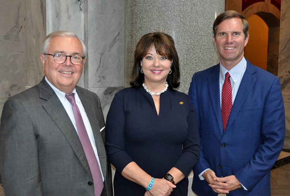 Chief Justice John D. Minton Jr., Justice Debra Hembree Lambert and Gov. Andy Beshear pose for a photo at a news conference Thursday to announce the new Kentucky Judicial Commission on Mental Health. Lambert will serve as the panel’s chairperson.