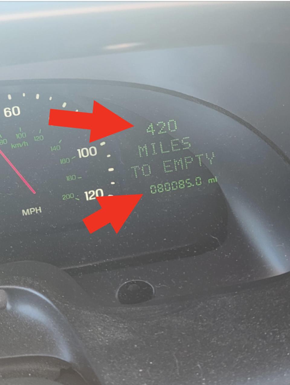 Car dashboard displaying 420 miles to empty with an odometer reading of 88085.0 miles