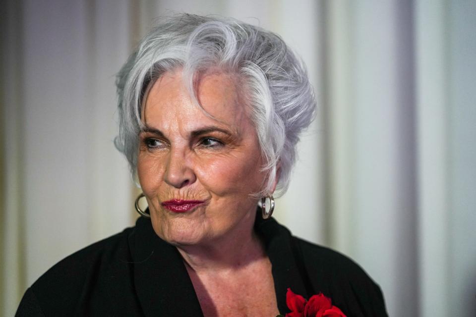 Paola Tulliani-Zen prepares before a debate with Republican candidates ahead of the Aug. 2 primary election for the Arizona governor's office on Wednesday, June 29, 2022, in Phoenix.