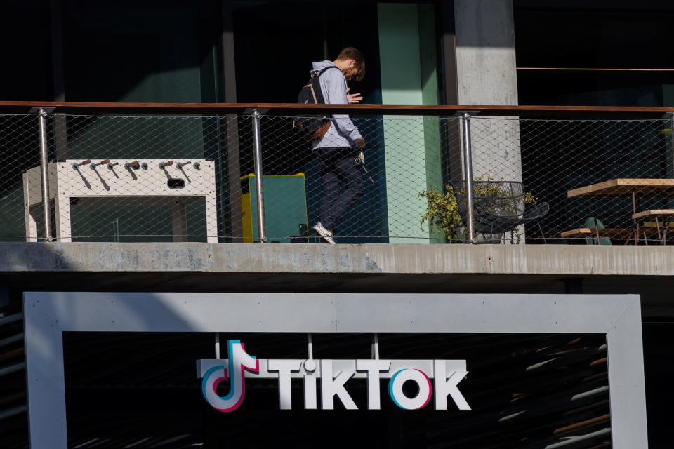A person arrives at the offices of Tik Tok after the U.S. House of Representatives overwhelmingly passed a bill that would give TikTok's Chinese owner ByteDance about six months to divest the U.S. assets of the short-video app or face a ban, in Culver City, California, U.S., March 13, 2024.  REUTERS/Mike Blake