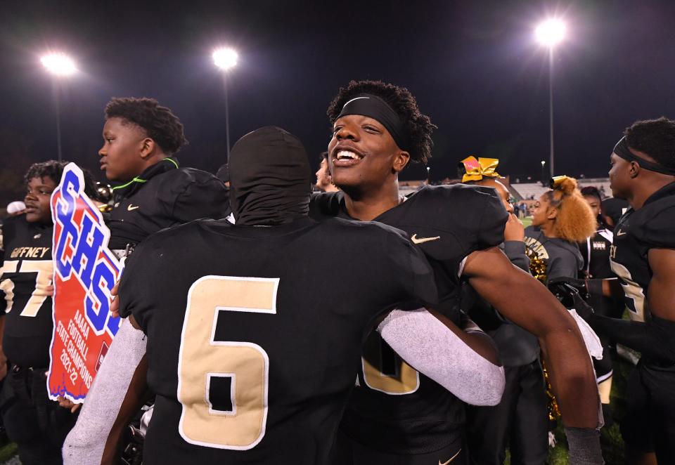 The Gaffney Indians take on the Dutch Fork Silver Foxes in the SCHSL AAAAA State Championship football game, held at Benedict College in Columbia, Saturday evening, December 4, 2021. Gaffney celebrates their state championship win after the game Saturday.