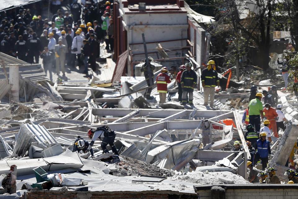 Emergency responders work at the site of an explosion at a maternity hospital in Mexico City