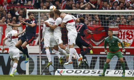 Football Soccer - VfB Stuttgart v Bayern Munich - German Bundesliga - Mercedes-Benz Arena, Stuttgart, Germany 09/04/16 Bayern Munich's David Alaba in action with VfB Stuttgart's Timo Werner, Kevin Stoeger and Toni Sunjic . REUTERS/Kai Pfaffenbach