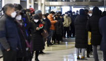 FILE - In this Feb. 24, 2020, file photo, people line up to buy face masks at a store in Daegu, South Korea. Fear of the spreading coronavirus has led to a global run on sales of face masks despite medical experts' advice that most people who aren't sick don't need to wear them. (Lee Moo-ryul/Newsis via AP, File)