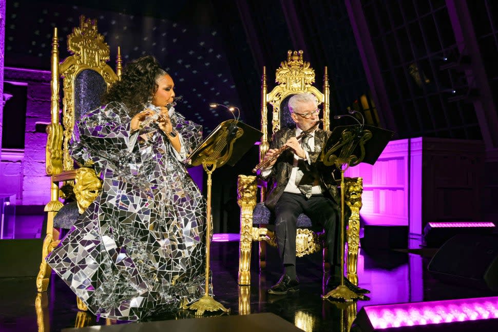 Lizzo and James Galway perform onstage during The 2023 Met Gala Celebrating 