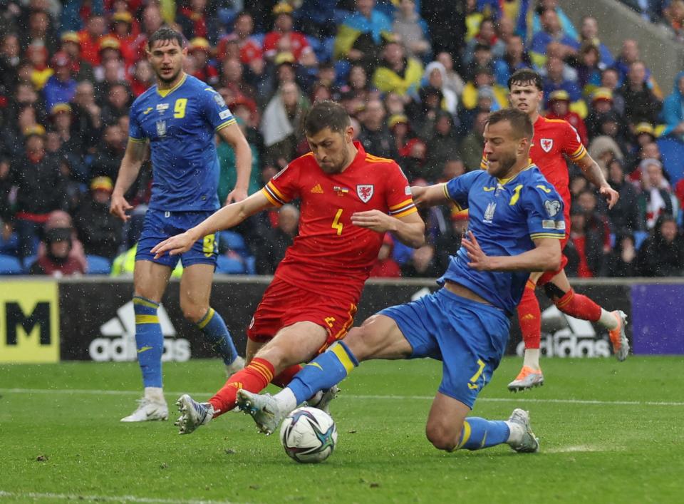 Ben Davies blocks off Andriy Yarmolenko (Action Images via Reuters)