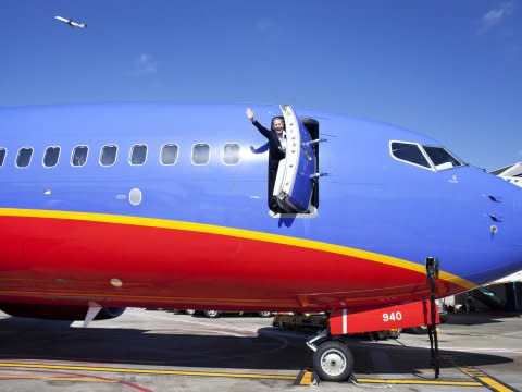 southwest airlines flight attendant plane wave