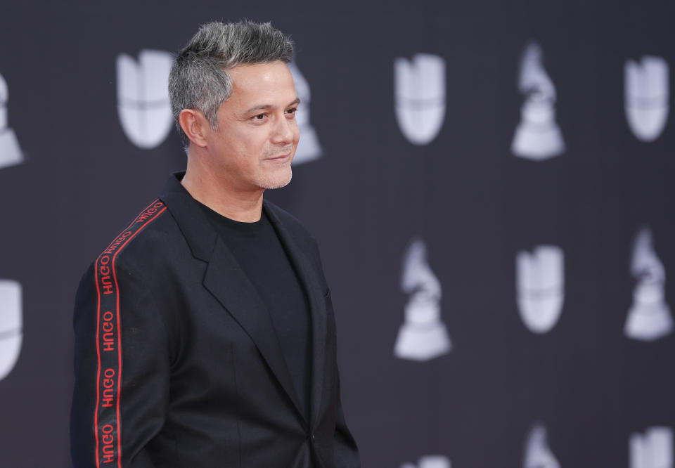FILE - Alejandro Sanz arrives at the 20th Latin Grammy Awards on Nov. 14, 2019, in Las Vegas. Sanz performed "Imagine" by John Lennon and Yoko Ono, with John Legend, Keith Urban and Angelique Kidjo via pre-recorded video at the opening ceremony of the Tokyo Olympics on July 23, 2021. (Photo by Eric Jamison/Invision/AP, File)