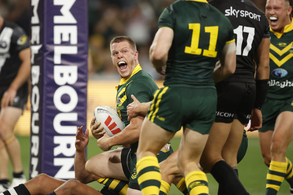 Lindsay Collins celebrates his try.