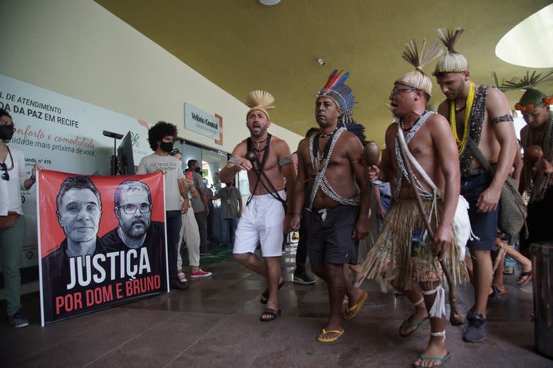 Xukuru Indigenous people perform a ritual during the funeral of Brazilian indigenous expert Bruno Pereira, who was murdered in the Amazon