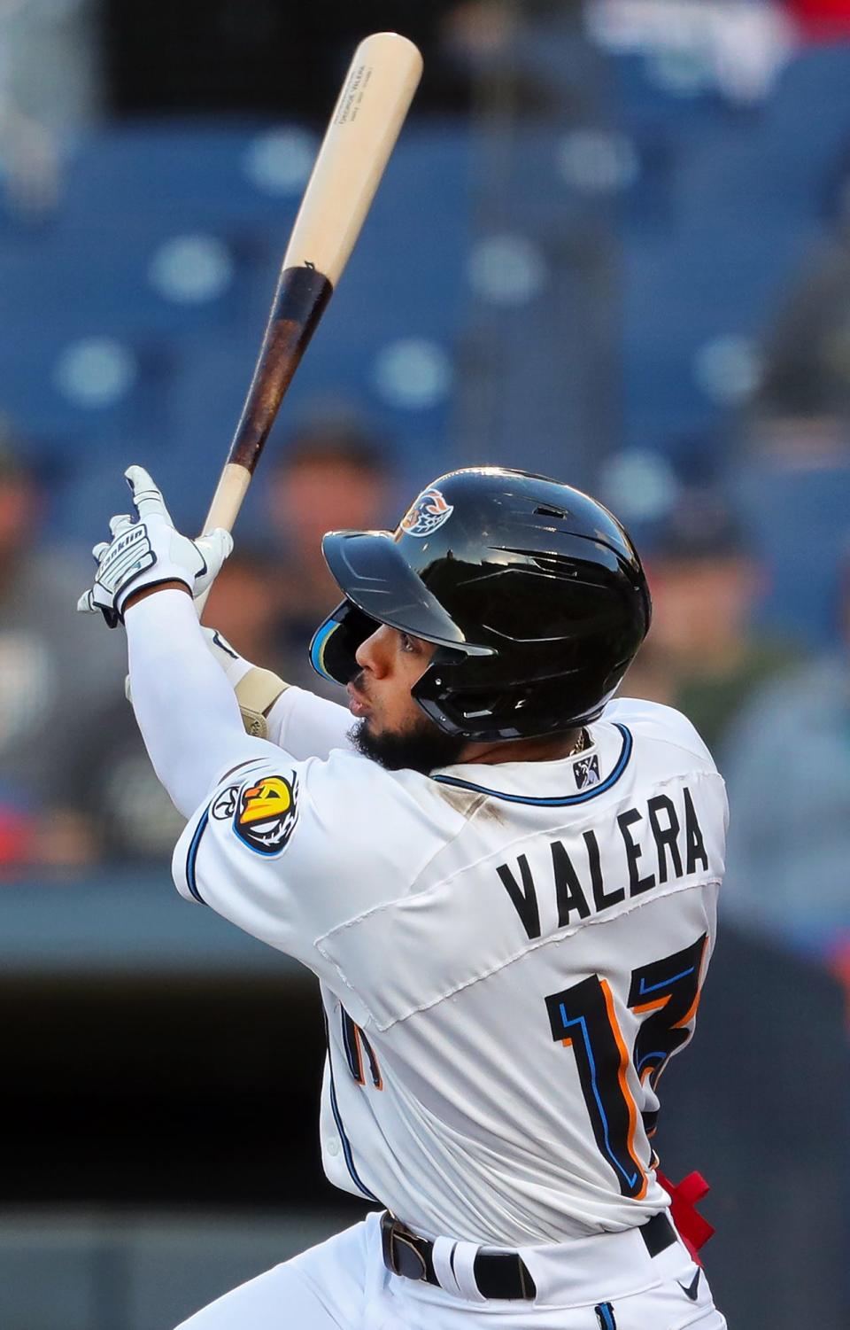 Akron RubberDucks outfielder George Valera (13) watches his line drive shot to right field during the first inning of a Minor League Baseball game against the Reading Fightin Phils at Canal Park on Tuesday.