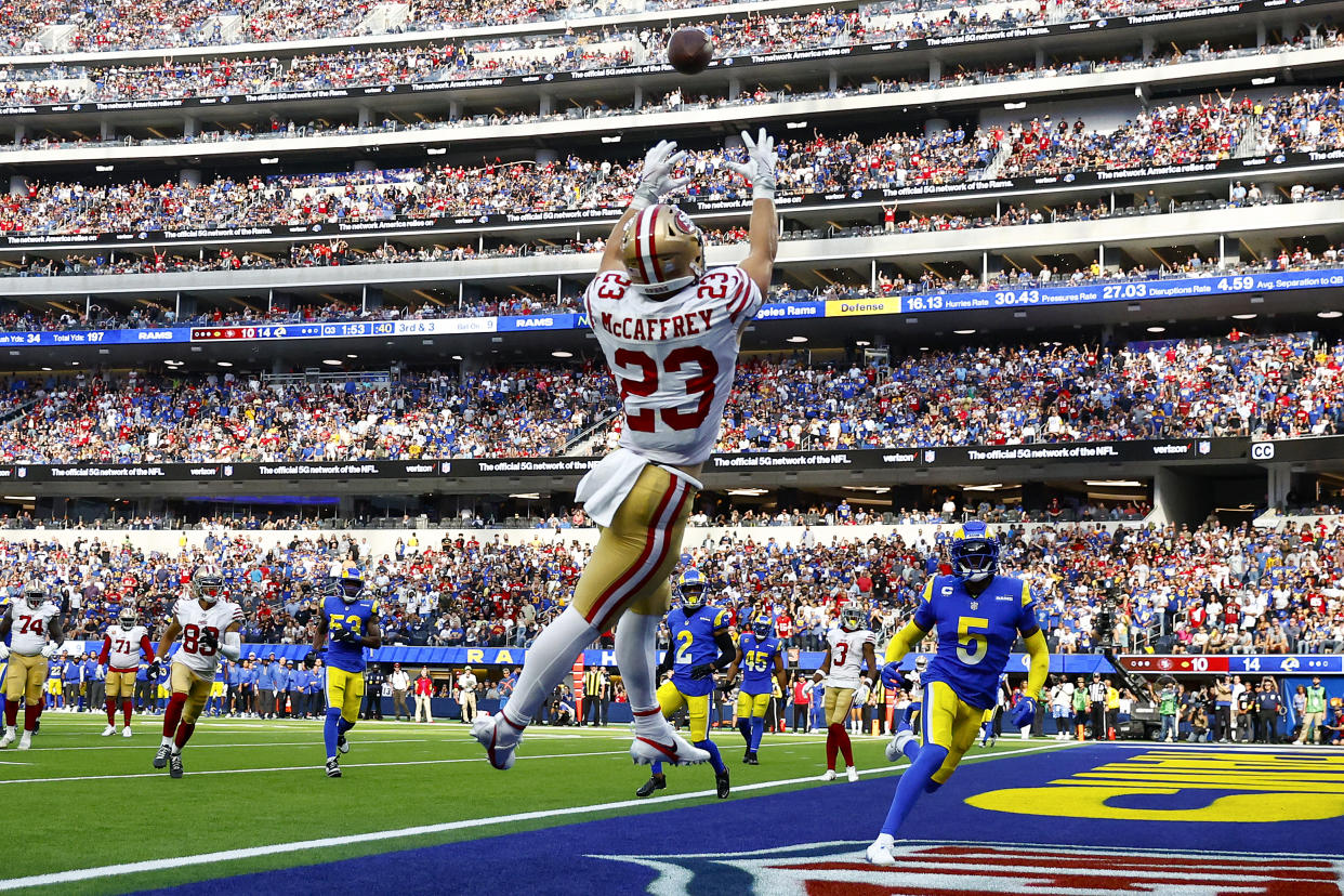 Christian McCaffrey caught, ran for and threw for a touchdown against the Rams on Sunday in the 49ers' victory. (Photo by Ronald Martinez/Getty Images)