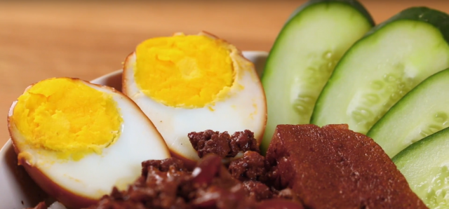 Serve the braised meat with warm rice, hard-boiled eggs, tau kwa and cucumber