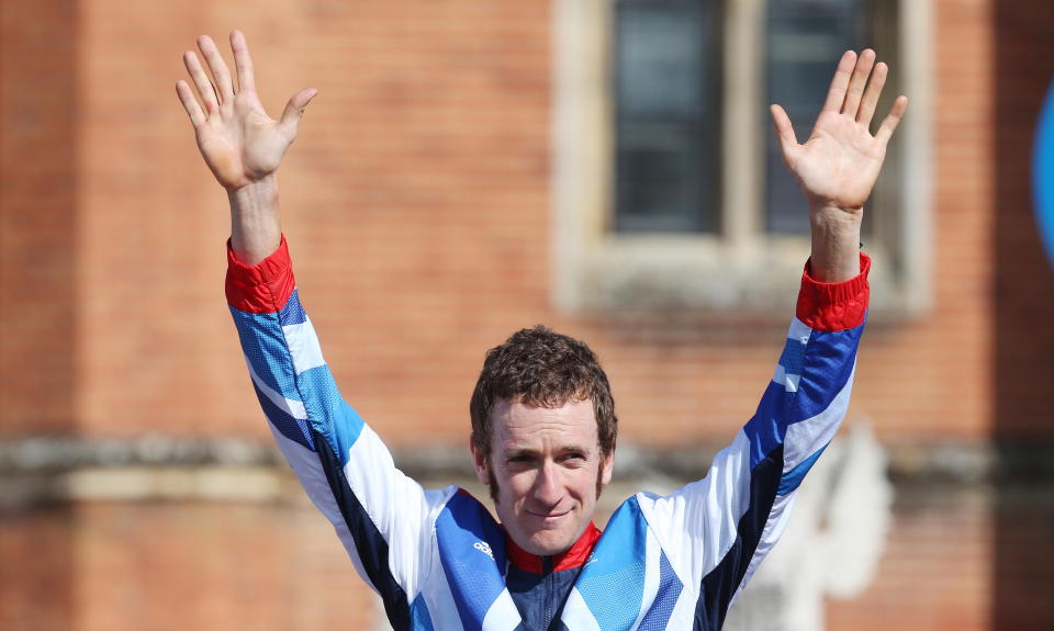 Olympics - London 2012 Olympic Games - London - 1/8/12 
Cycling - Road - Men's Individual Time Trial - Great Britain's Bradley Wiggins celebrates winning his gold medal after the race. Wiggins is now the most successful British Olympian of all time after winning his seventh medal 
Mandatory Credit: Action Images / Paul Childs 
Livepic 
PLEASE NOTE: FOR EDITORIAL USE ONLY