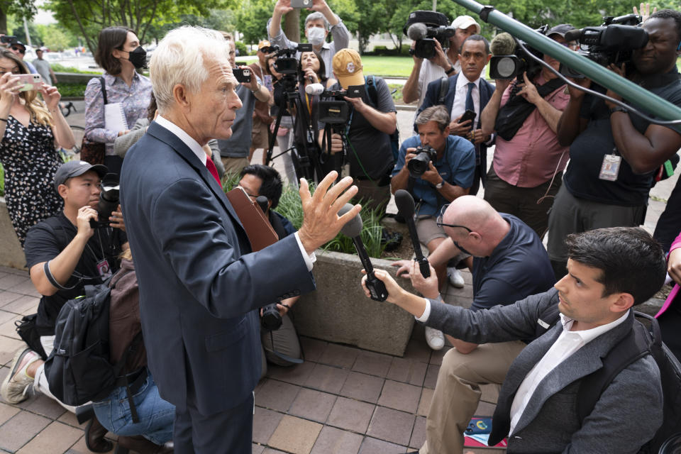 Former Trump White House official Peter Navarro speaks to reporters Friday, June 3, 2022, outside of federal court in Washington. Navarro was indicted Friday on contempt charges after defying a subpoena from the House panel investigating the Jan. 6 attack on the U.S. Capitol. (AP Photo/Jacquelyn Martin)