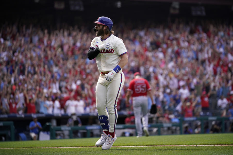 Philadelphia Phillies' Bryce Harper reacts after hitting a two-run home run against Los Angeles Angels pitcher Matt Moore during the eighth inning of a baseball game, Wednesday, Aug. 30, 2023, in Philadelphia. (AP Photo/Matt Slocum)