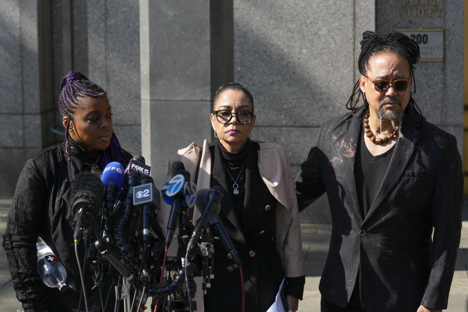 Kathryn Townsend Griffin, center, daughter of singer and songwriter Ed Townsend, speaks outside New York Federal Court before the start of a copyright infringement trial against singer Ed Sheeran, Tuesday, April 25, 2023, in New York. Standing with her is Queen Cora Coleman, left, and Kirk Williams. (AP Photo/Seth Wenig)