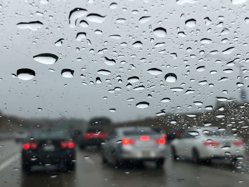 FILE PHOTO: Thanksgiving traffic crawls in a rainstorm in Claremont