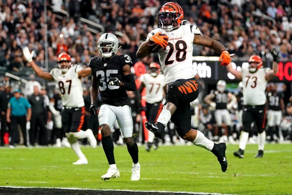 Cincinnati Bengals running back Joe Mixon (28) scores a touchdown in the fourth quarter during a NFL Week 11 game against the Las Vegas Raiders, Sunday, Nov. 21, 2021, at Allegiant Stadium in Las Vegas.