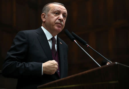 Turkish President Tayyip Erdogan addresses members of parliament from his ruling AK Party (AKP) during a meeting at the Turkish parliament in Ankara, Turkey, January 9, 2018. REUTERS/Umit Bektas