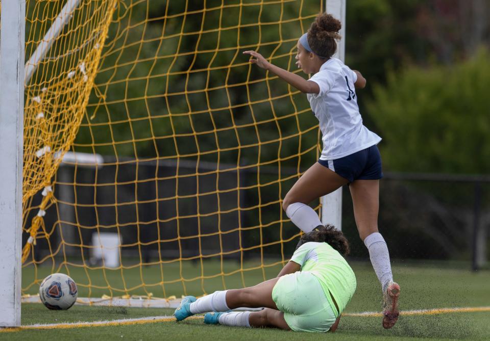 Freehold Gaby Parker races to kick in a loose ball in front of goal. Freehold Township Girls Soccer defeats Manalapan 4-0 in Manalapan, NJ on September 20, 2022. 