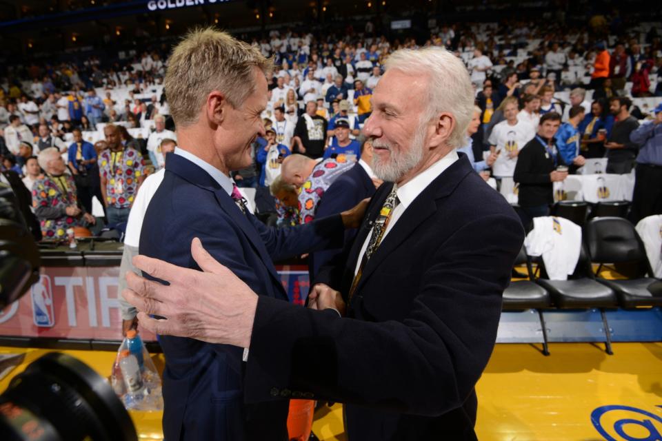 Steve Kerr (left) and Gregg Popovich are two of several coaches to address hot-button off-court issues. (Getty Images)