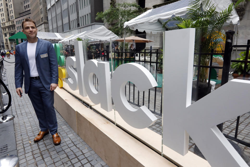 Slack CEO Stewart Butterfield poses for photos outside the New York Stock Exchange before his company's IPO, Thursday, June 20, 2019. (AP Photo/Richard Drew)