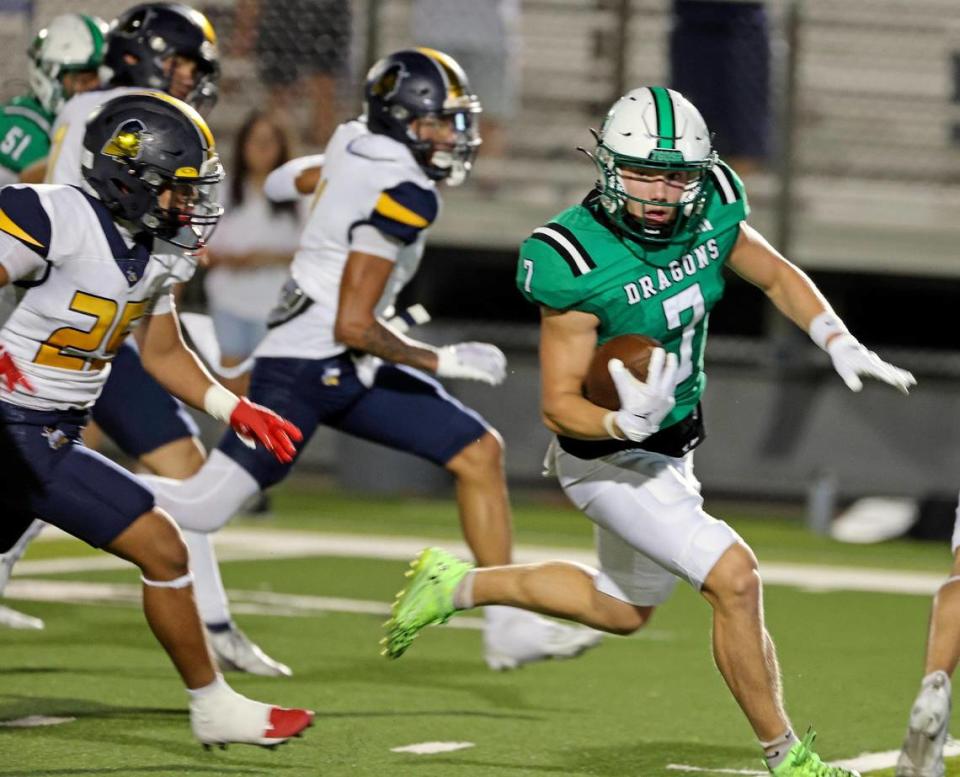 Carroll wide receiver Jacob Jordan (7) is pursued up the middle for the Dragons third touchdown in the first half of an UIL football game at Dragon Stadium in Southlake, Texas, Friday Aug. 25, 2023. Southlake led Eastwood 42-14 at the half. (Special to the Star-Telegram Bob Booth)