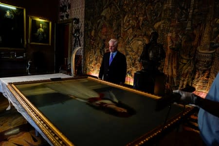 Carlos Fitz-James Stuart, Duke of Alba stands behind "XIII Duchess of Alba" painting by the Spanish painter Francisco Goya at Liria Palace in Madrid