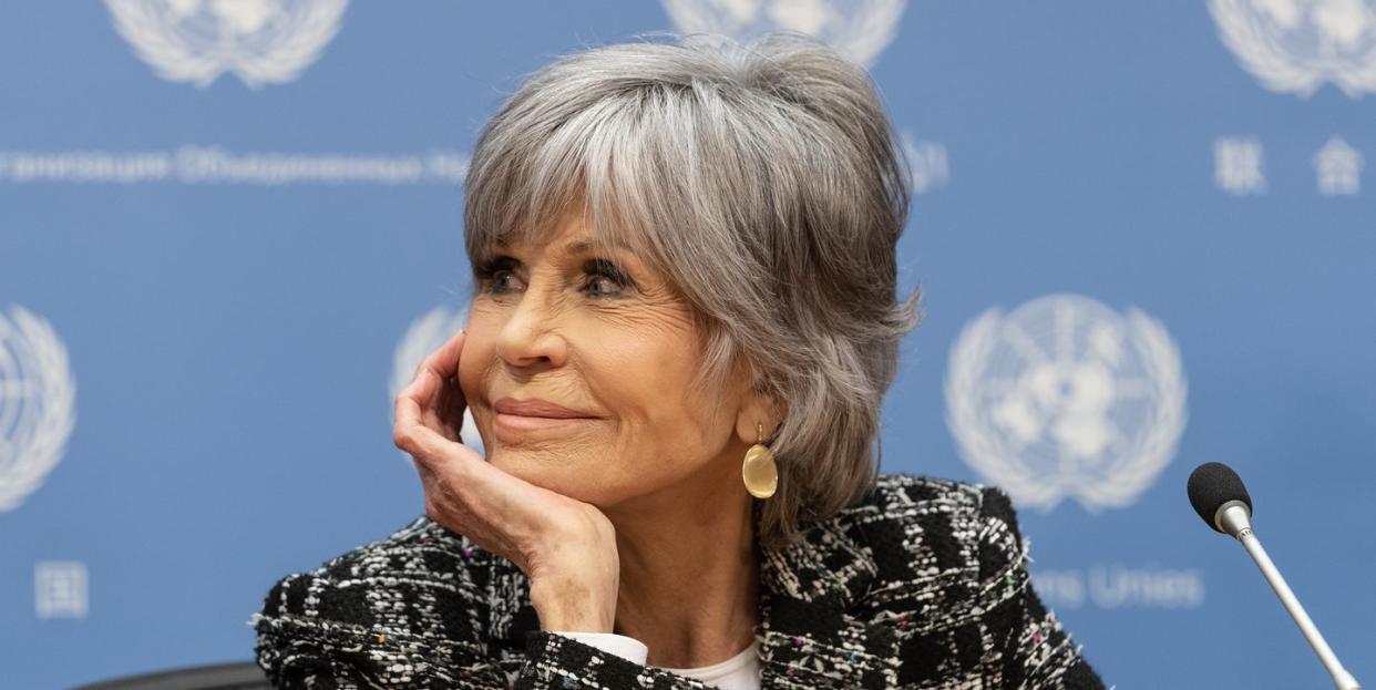 jane fonda participates with herve berville, secretary of