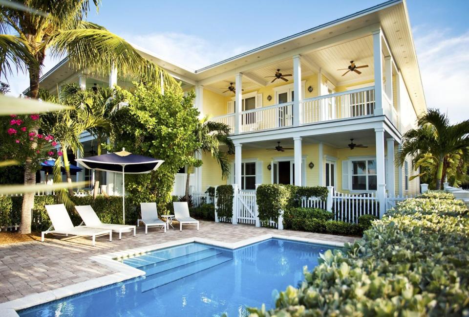 <p>It doesn't get much more idyllic than a luxurious island of villas located a stone's throw from the hustle-and-bustle of Key West. <a href="https://www.sunsetkeycottages.com/" rel="nofollow noopener" target="_blank" data-ylk="slk:Sunset Key Cottages;elm:context_link;itc:0;sec:content-canvas" class="link ">Sunset Key Cottages</a> is considered by many to be the best resort in the Sunshine State for many reasons. Maybe it's the bougainvillea-laced cottages, award-winning restaurant, or unique personal touches, like breakfast baskets delivered to your door, that make this place beloved by visitors of all ages. </p>