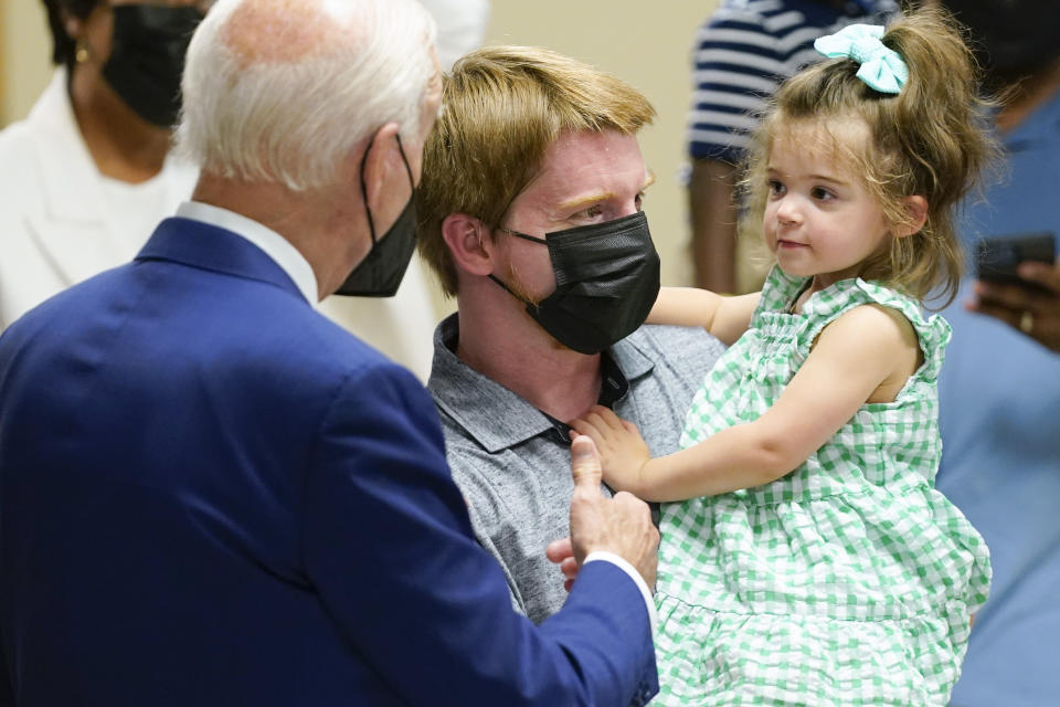 President Joe Biden visits a COVID-19 vaccination clinic at the Church of the Holy Communion Tuesday, June 21, 2022, in Washington. (AP Photo/Evan Vucci)