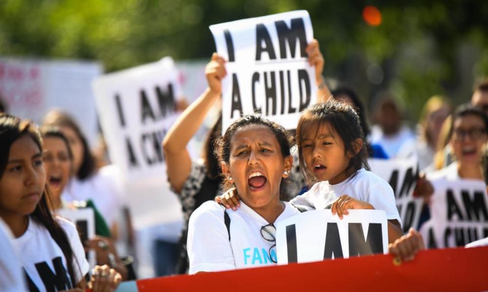 Families march in Washington. Advocates and attorneys said this week that they have spoken to parents who they believe were coerced into being deported without their children.