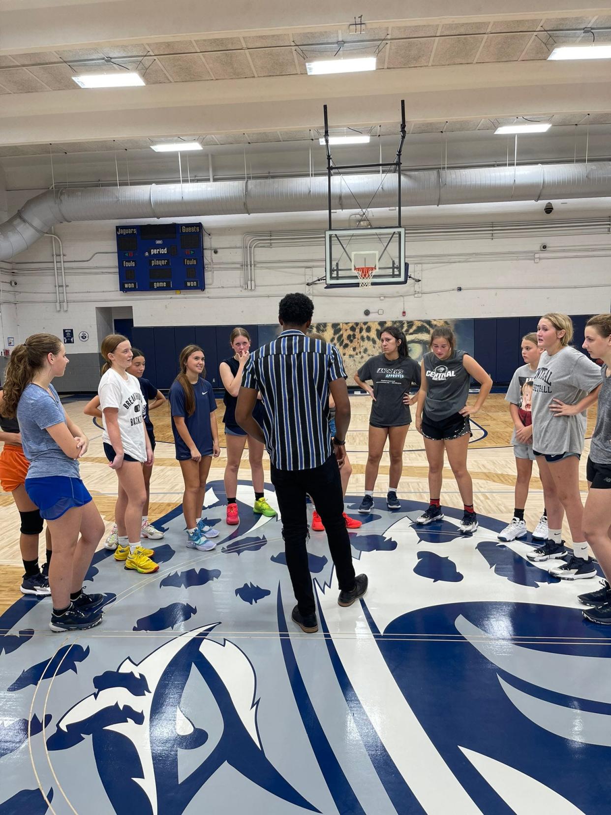 Central girl's basketball new head coach Lewayne Jones meets with his team for the first time.