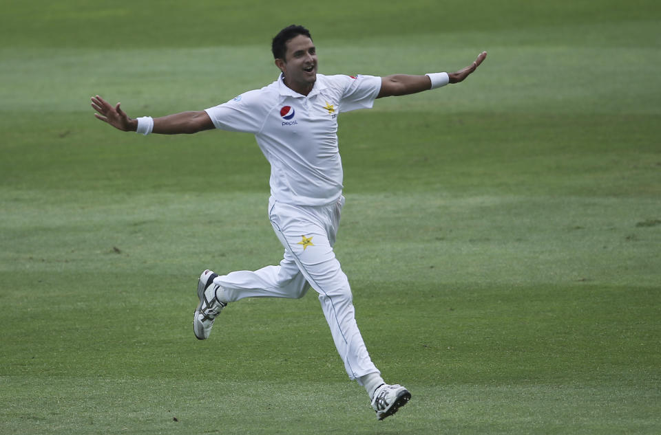 Pakistan's Mohammad Abbas celebrates the dismissal of Australia's Tim Paine in their test match in Abu Dhabi, United Arab Emirates, Friday, Oct. 19, 2018. (AP Photo/Kamran Jebreili)