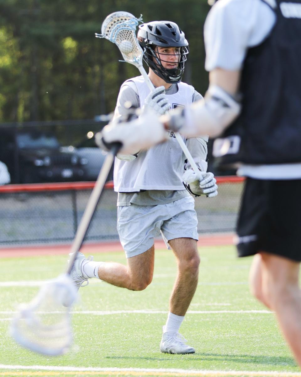 Oliver Ames' Ben Reardon during lacrosse practice on Wednesday, May 10, 2023.