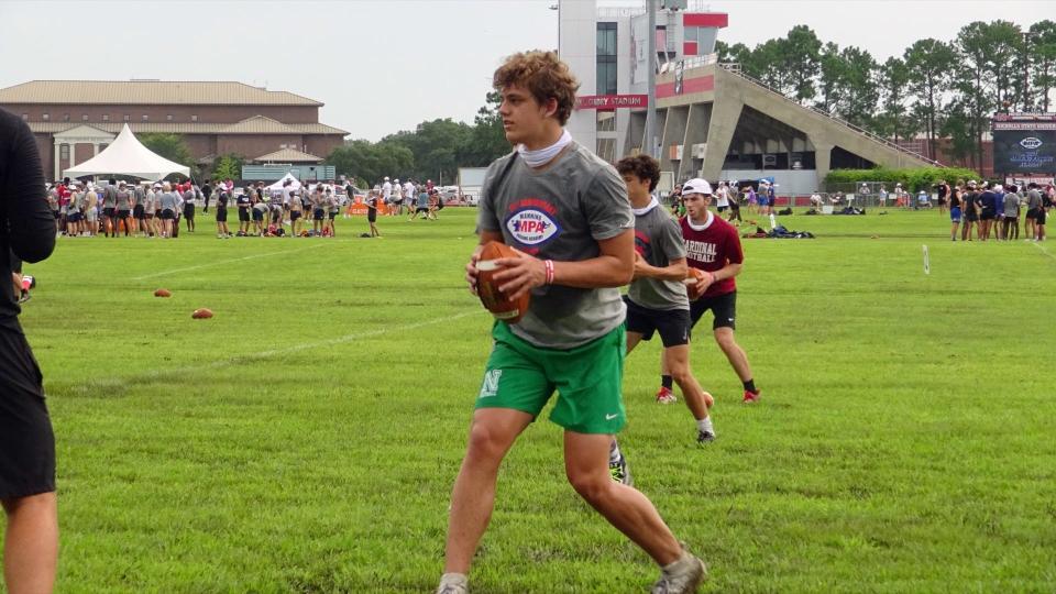 Newman 2023 quarterback Arch Manning participates in a passing drill at the Manning Passing Academy held at Nicholls State in Thibodaux on July 16.