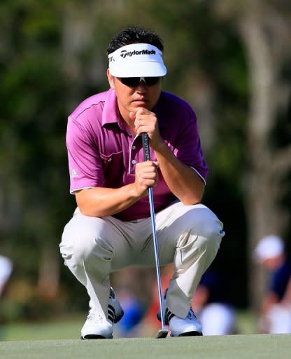 Charlie Wi of South Korea plays a shot on the 4th hole during the third round of the Children's Miracle Network Hospitals Classic at the Disney Magnolia course in Lake Buena Vista, Florida